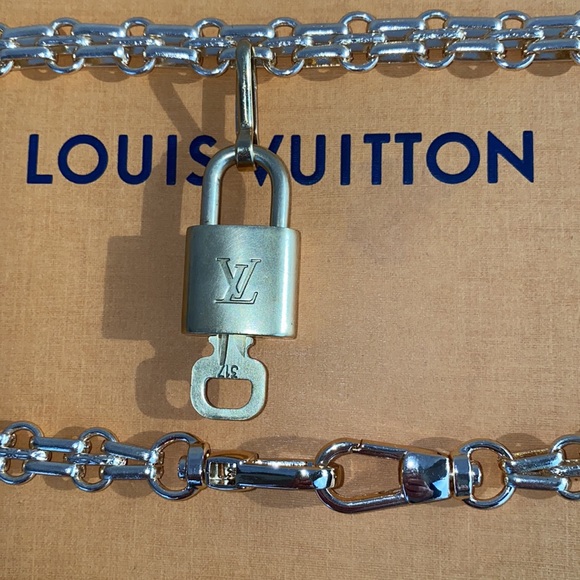 Authentic Louis Vuitton Lock and Key Set on a Chain. - Picture 7 of 10
